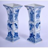 A PAIR OF 17TH/18TH CENTURY CHINESE BLUE AND WHITE VASES Kangxi/Yongzheng, painted with beasts and f