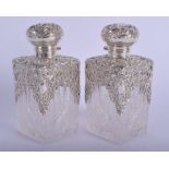 A PAIR OF EARLY 20TH CENTURY SILVER MOUNTED CRYSTAL SCENT BOTTLES. Birmingham 1903. 38.6 oz overall.