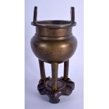 A 19TH CENTURY CHINESE TWIN HANDLED BRONZE CENSER Late Qing, bearing shishou style mark to base. Bro