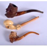 THREE ANTIQUE MEERSCHAUM PIPES. Largest 13 cm long. (3)