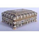 A 19TH CENTURY ANGLO INDIAN CARVED IVORY AND RHINOCEROS HORN CASKET decorated with figures. 18 cm x
