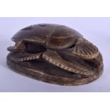 AN EARLY 20TH CENTURY CONTINENTAL CARVED STONE SCARAB BEETLE. 7 cm x 4.5 cm.