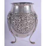 AN ANTIQUE MIDDLE EASTERN SILVER VASE decorated with foliage and vines. 7.8 oz. 14 cm high.