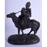 AN ANTIQUE RUSSIAN CAST IRON FIGURE OF A COSSACK modelled roaming upon a horse. 24 cm x 15 cm.