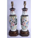 A PAIR OF CHINESE REPUBLICAN PERIOD FAMILLE ROSE VASES converted to lamps, painted with figures with
