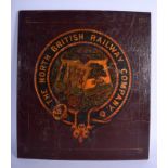 AN ANTIQUE NORTH BRITISH RAILWAY COMPANY LACQUERED PANEL. 41 cm square.