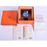 A BOXED HERMES BLUE CLIPPER WRISTWATCH. 3.25 cm wide.