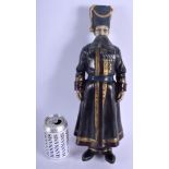 A LARGE CONTINENTAL COLD PAINTED BRONZE FIGURE OF A RUSSIAN COSSACK modelled in military robes. 40 c