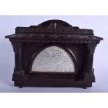 AN ANTIQUE CARVED WOOD AND SILVER MIRRORED FRAME decorated with foliage. 23 cm x 21 cm.
