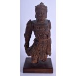 A 17TH/18TH CENTURY JAPANESE EDO PERIOD CARVED WOOD WARRIOR modelled in robes. Figure 25 cm x 11 cm.