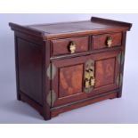 A 1950S CHINESE HARDWOOD MINAITURE APPENTICE CABINET with brass mounts. 32 cm x 27 cm.