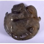 AN EARLY 20TH CENTURY CHINESE CARVED JADE ROUNDEL Late Qing/Republic. 4.5 cm wide.