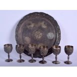 A RARE SET OF SIX 19TH CENTURY CHINESE EXPORT SILVER CUPS upon a silver dragon stand. 300 grams. Sta