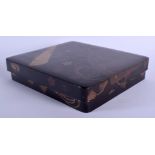 A 19TH CENTURY JAPANESE MEIJI PERIOD CARVED BLACK LACQUER WRITING BOX with internal inkstone. 24 cm