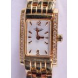 AN 18CT GOLD LONGINES DIAMOND WRISTWATCH with gold strap. 59 grams. 1.75 cm wide, strap 18 cm long.