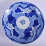 AN 18TH CENTURY JAPANESE EDO PERIOD BLUE AND WHITE ARITA DISH painted with birds. 18 cm diameter.