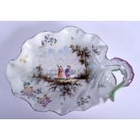 AN 18TH/19TH CENTURY CONTINENTAL PORCELAIN LEAF SHAPED DISH possibly Lille, painted with figures. 25