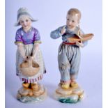 A PAIR OF 19TH CENTURY GERMAN PORCELAIN FIGURES possibly Hoscht, one holding a toy boat. 15 cm high.