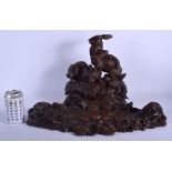 A RARE LARGE 19TH CENTURY BAVARIAN BLACK FOREST CARVED WOOD INKWELL modelled as two hares standing u