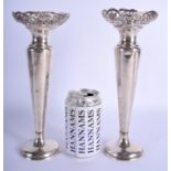 A PAIR OF VICTORIAN SILVER VASES. Sheffield 1896. 19.9 oz loaded. 26 cm high.