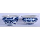 A PAIR OF 19TH CENTURY CHINESE BLUE AND WHITE CENSERS Qing, painted with script and foliage. 14 cm d