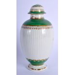 Worcester tea canister and cover with reeded body apple green bands and gilding. 14.5 cm wide.