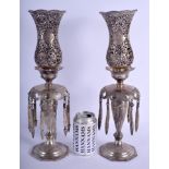A RARE PAIR OF PERSIAN SILVER 'ARMED LION' LUSTRES C1970 decorated with foliage and animals. 61.3 oz