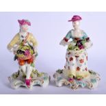 A PAIR OF 18TH CENTURY DERBY PORCELAIN FIGURES C1760 modelled as seated figures. 15 cm x 7 cm.