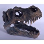 A LARGE CONTINENTAL MODEL OF A T REX SKULL. 36 cm x 24 cm.