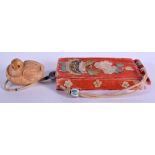 AN EARLY 20TH CENTURY JAPANESE MEIJI PERIOD SILKWORK PURSE with tagua nut netsuke toggle. Purse 7 cm