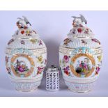 A LARGE PAIR OF EARLY 20TH CENTURY DRESDEN PORCELAIN VASES AND COVERS Meissen style, painted with fl