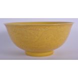 A FINE CHINESE QING DYNASTY IMPERIAL YELLOW GLAZED DRAGON BOWL Kangxi mark and period, incised with