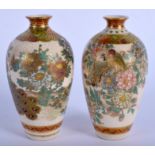 A PAIR OF 19TH CENTURY JAPANESE MEIJI PERIOD SATSUMA VASES painted with landscapes. 8.5 cm high.