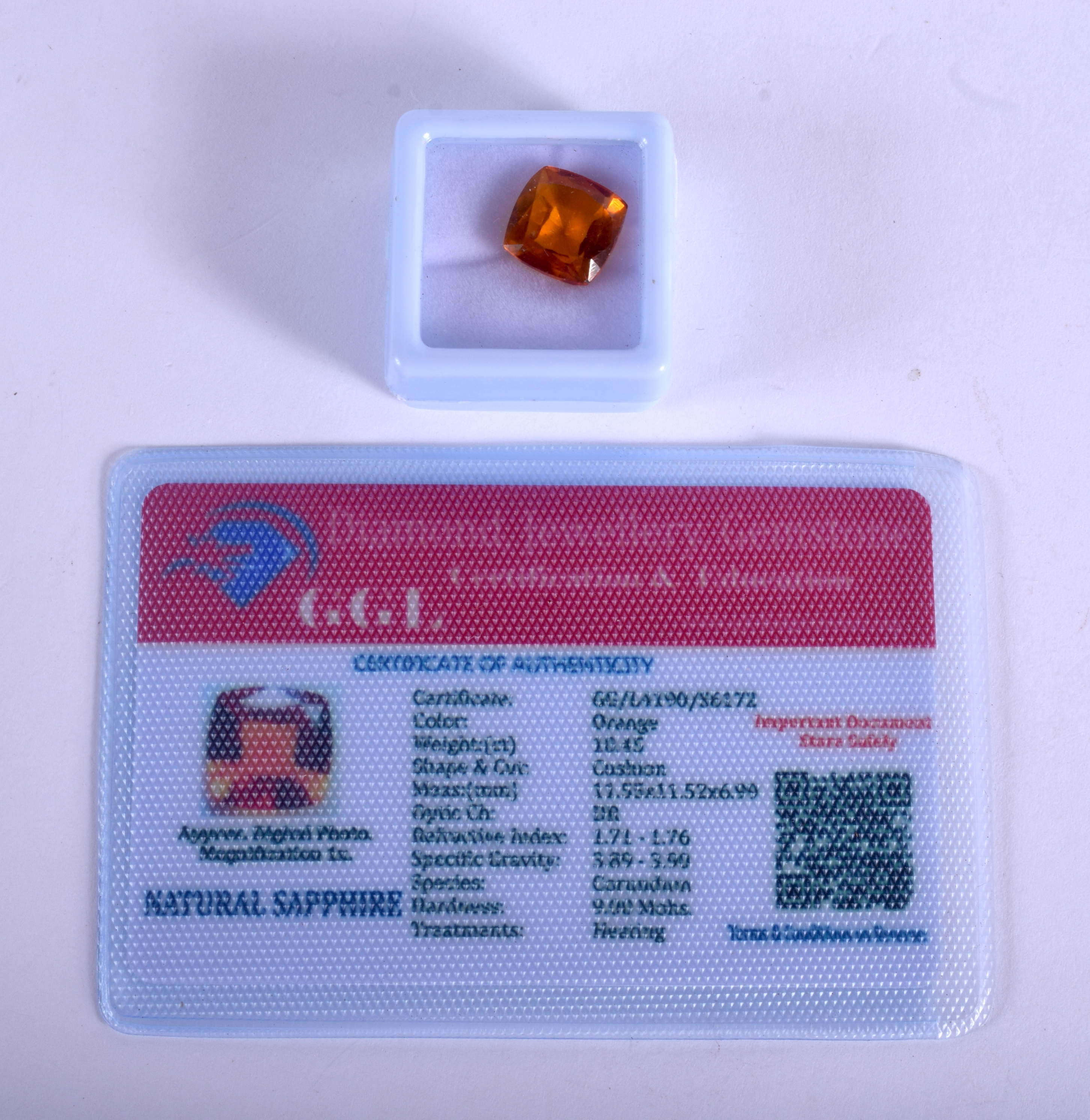 A 10CT ORANGE SAPPHIRE.