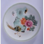 A CHINESE REPUBLICAN PERIOD FAMILLE ROSE DISH painted with birds amongst foliage. 27 cm diameter.