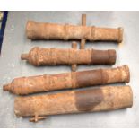 A SET OF FOUR 19TH CENTURY CHINESE CAST IRON CANNONS Daoguang & Tongzhi period, some bearing inscrip