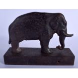 A VERY RARE VICTORIAN JUMBO THE ELEPHANT DOOR STOP upon a rectangular base. 26 cm x 20 cm.