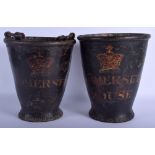 A CHARMING PAIR OF EARLY 19TH CENTURY SOMERSET HOUSE LEATHER FIRE BUCKETS painted with a coronet 31