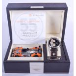 A BOXED RADILLON MOTOR RACING WRISTWATCH. 4 cm wide.