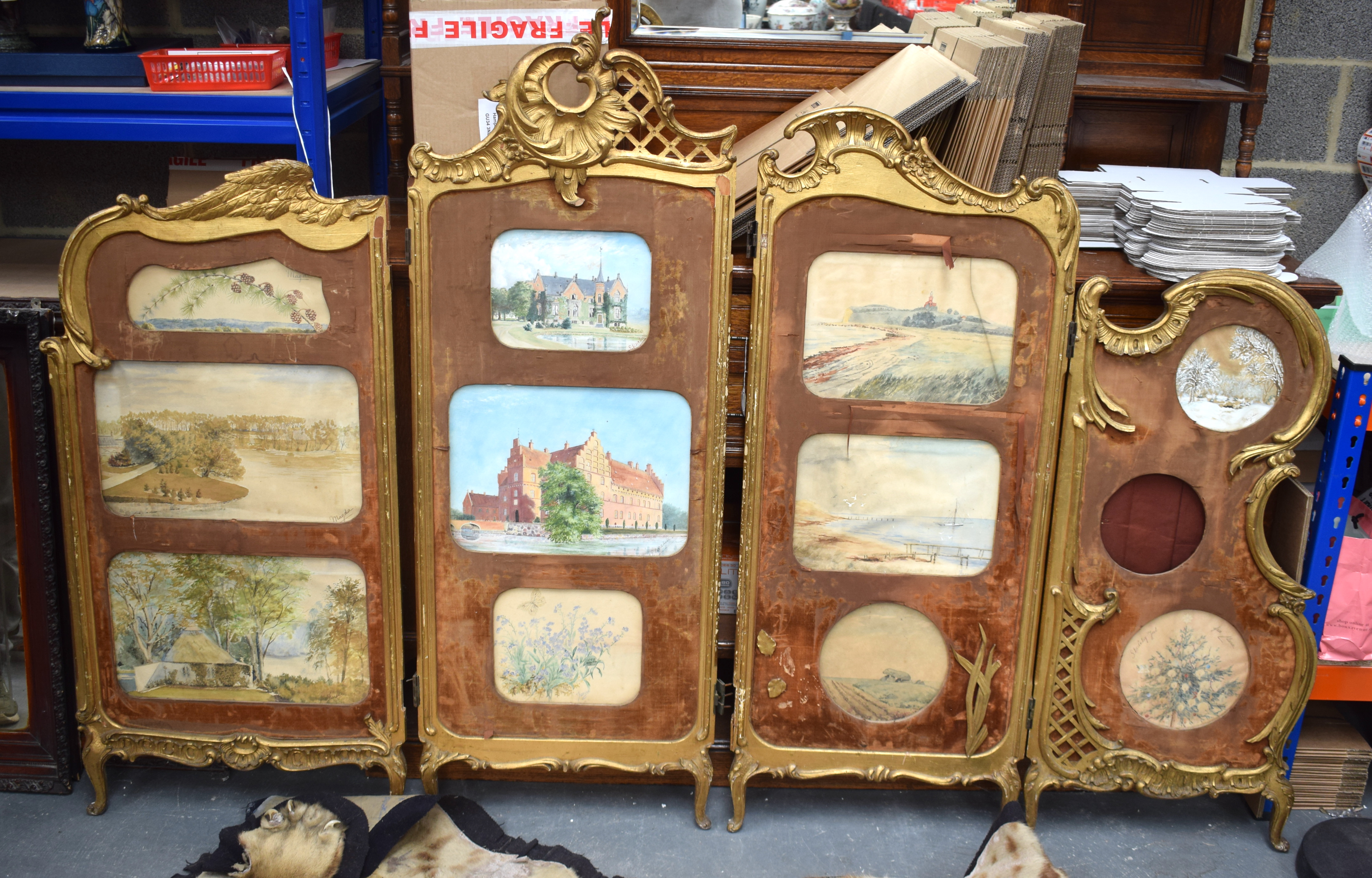 AN UNUSUAL 19TH CENTURY CONTINENTAL GILTWOOD SCREEN inset with painted watercolours. 146 cm x 226 cm