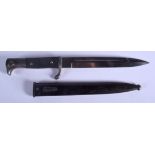 A GERMAN WWII BAYONET. 34 cm long.