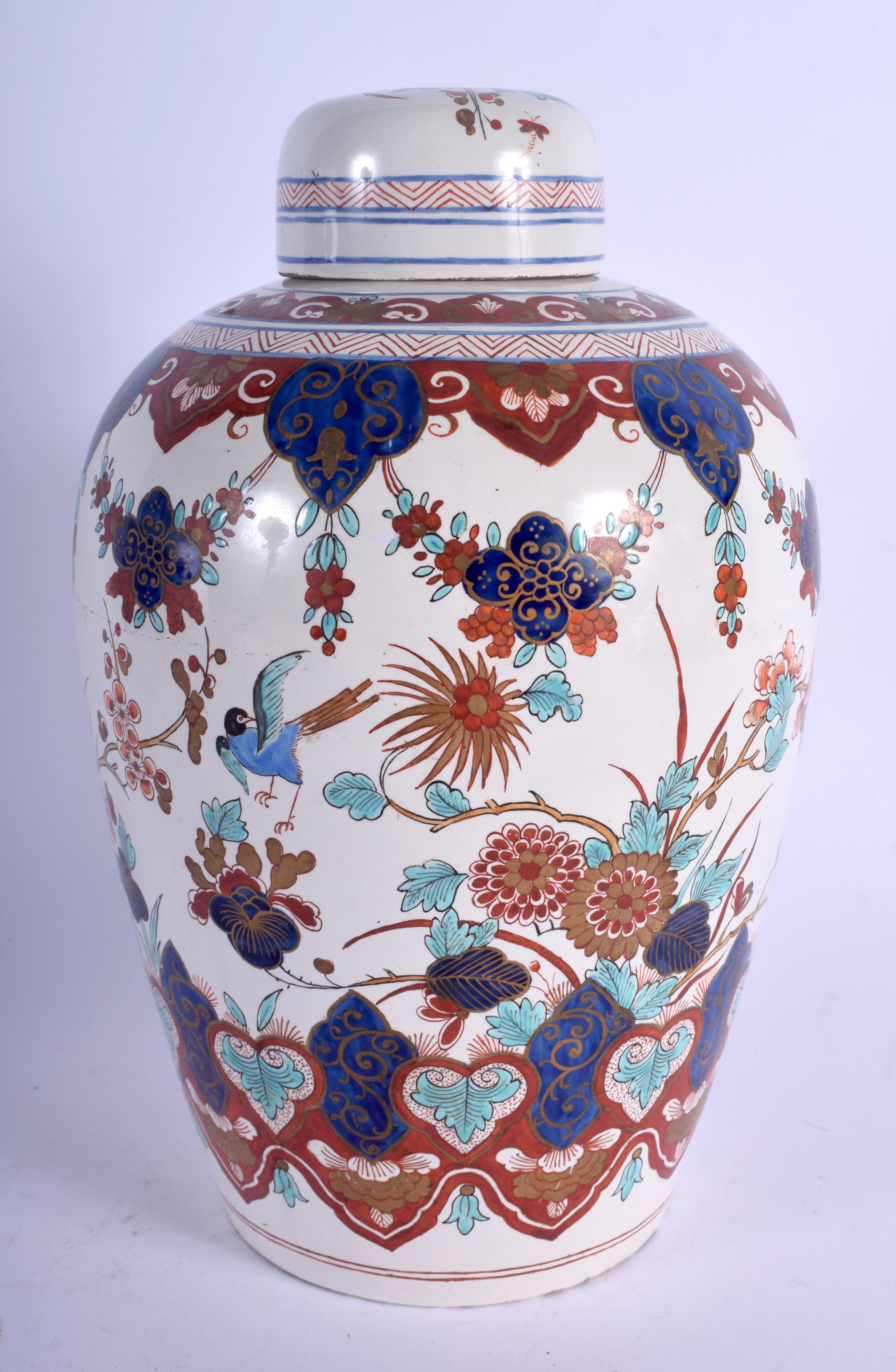 AN 18TH/19TH CENTURY DUTCH DELFT FAIENCE GLAZED JAR AND COVER painted with birds and flowers. 24 cm - Image 2 of 4