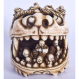A LOVELY 19TH CENTURY JAPANESE MEIJI PERIOD CARVED IVORY NETSUKE modelled as a buddhistic lion smoth