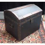 AN ANTIQUE TRAVELLING BOX with domed leather top. 51 cm x 60 cm.