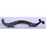 AN 18TH CENTURY CHINESE BRONZE STYLISED DRAGON BRUSH REST Qing. 16 cm long.