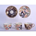 Coalport teacup and saucer gilded Chinese style animals and a New Hall trio, circle mark. 14 cm wide