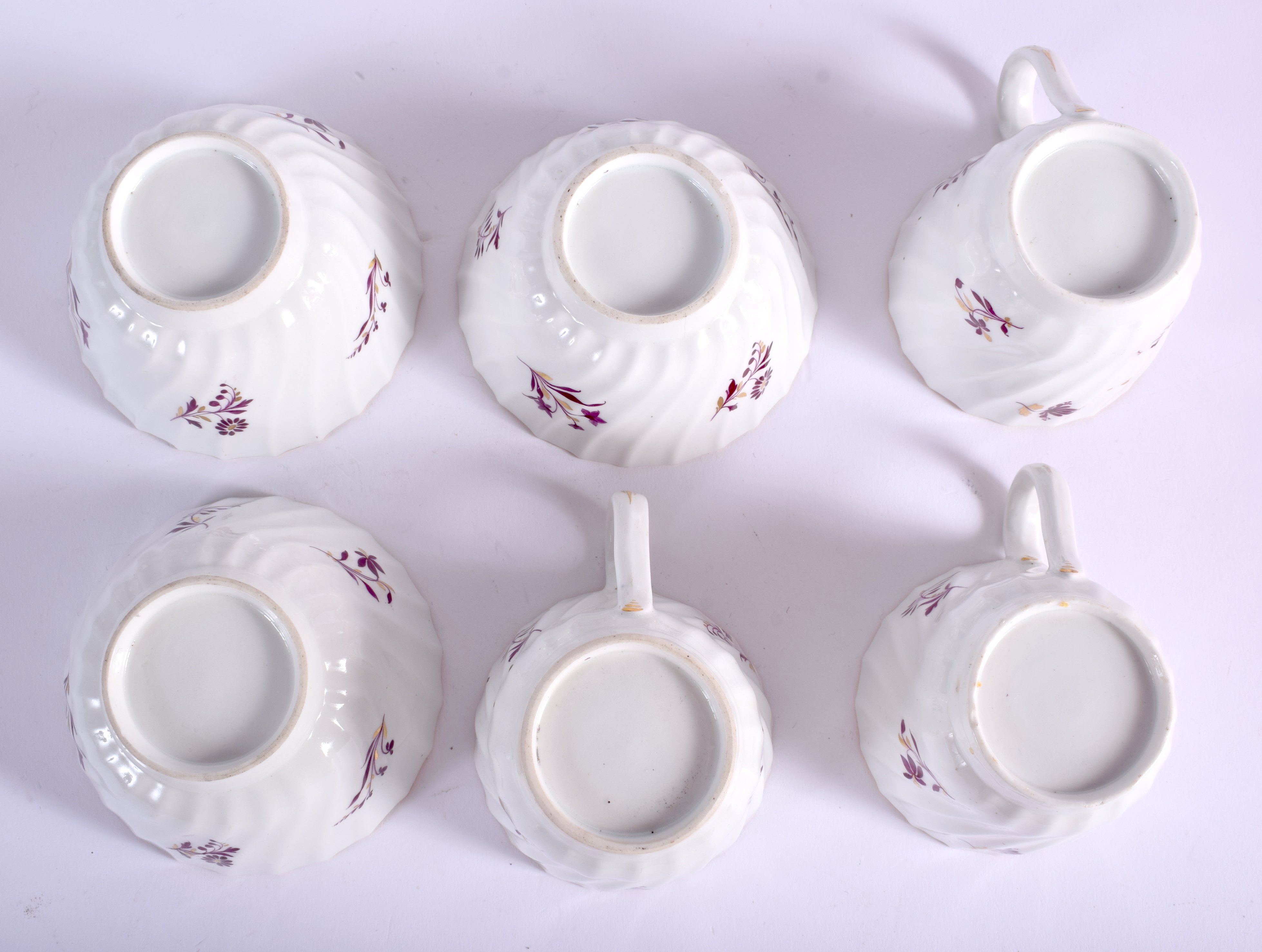Three Flight coffee cups, saucers and teabowls and a match slop bowl with puce flowers. 19.5 cm wide - Image 2 of 4