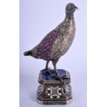A LOVELY 19TH CENTURY AUSTRIAN VIENNESE RUBY SILVER AND ENAMEL FIGURE modelled as a bird upon a lapi