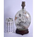 A LARGE EARLY 20TH CENTURY CHINESE REVERSE PAINTED SNUFF BOTTLE depicting a bird upon hollow rock. S