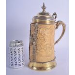 A 19TH CENTURY ENGLISH SILVER TANKARD by George Frederick Pinnell, London 1861, the ivory made durin